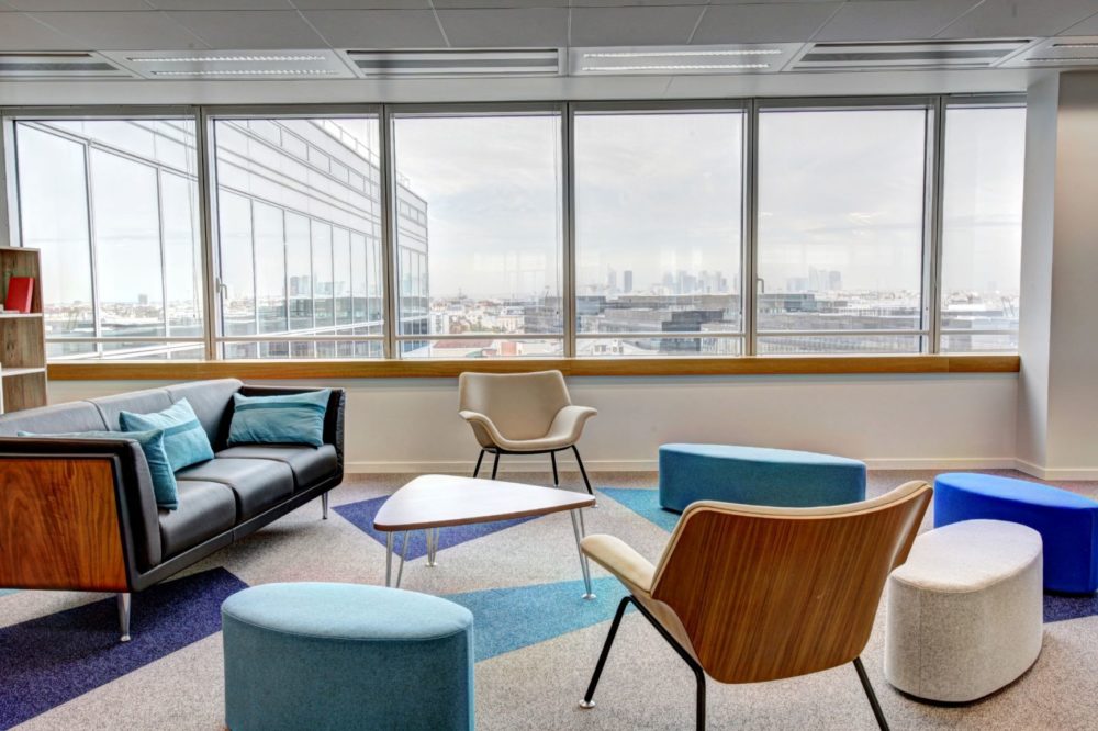 A room with chairs and a couch